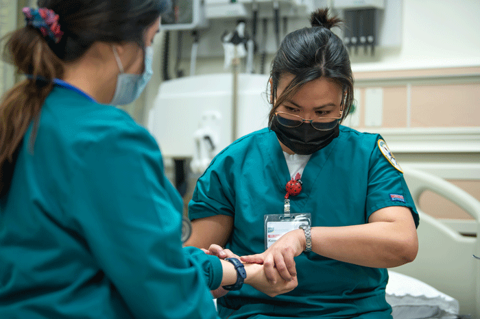 Nursing students in lab