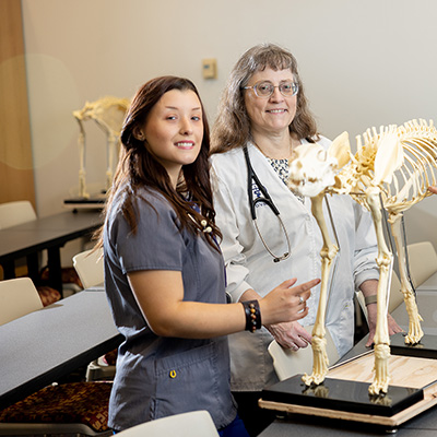 Professor with student in lab