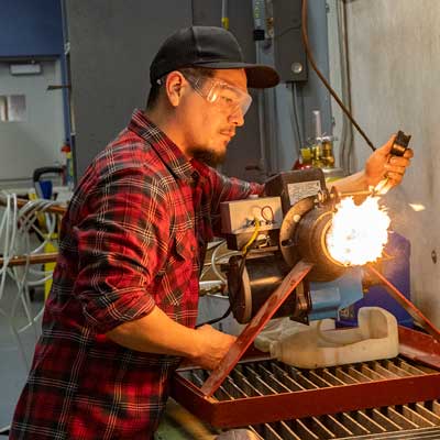 Man firing heat unit